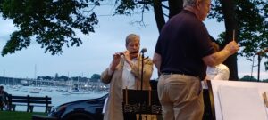 Band performing as the evening light changes